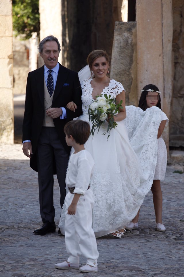 Maria Torretta con su padre Roberto Torretta el día de su boda