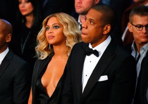 Beyonce y Jay-Z acudiendo al combate en el Centro Mandalay Bay Events