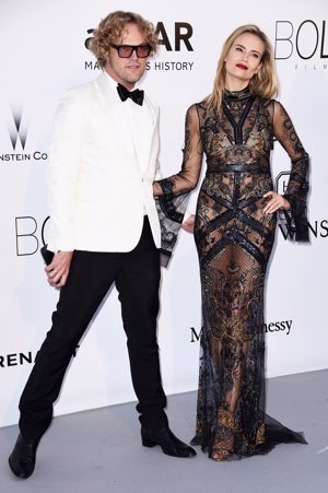 Natasha Poli y Peter Dundas en la Gala Amfar 2016 en Cannes