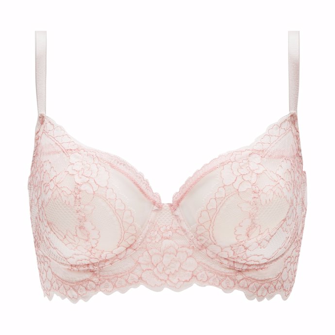 Elaborado en tul con flores bicolor, la cinta elástica que recorre el contorno lo convierte en un modelo glamuroso y sexy. Proporciona un efecto redondeado ideal. Disponible hasta la copa G