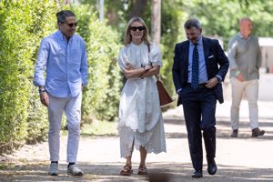 La presidenta de Inditex, con su marido en el Club de Campo Villa de Madrid