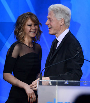 GETTY IMAGES: Jennifer Lawrence y Bill Clinton