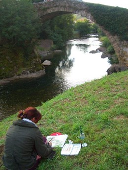 Una artista ante el Puente Romano (s. XVI).