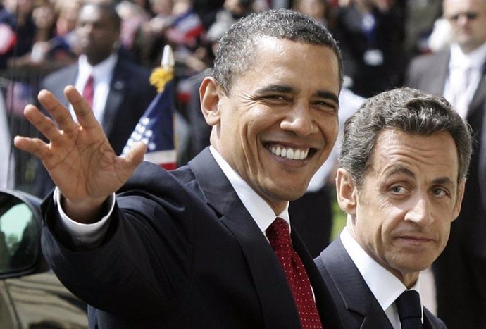 Obama y Sarkozy, en Normandia