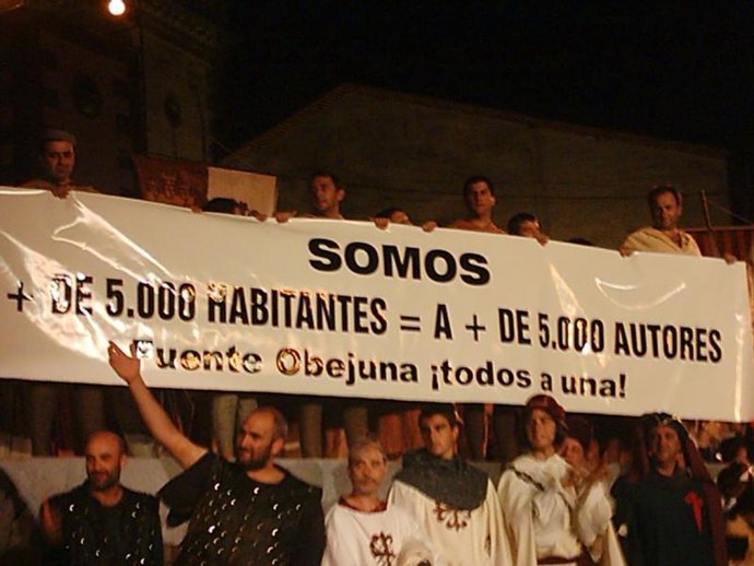 manifestantes con pancarta
