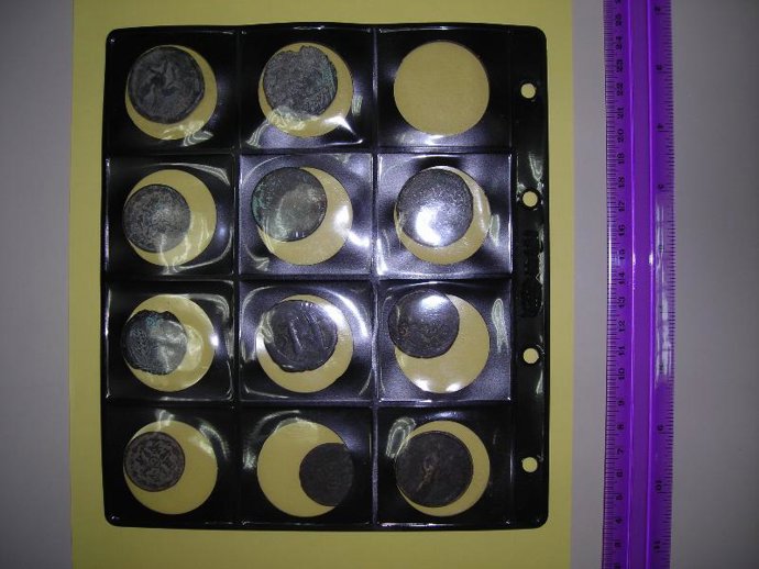 Monedas antiguas intervenidas