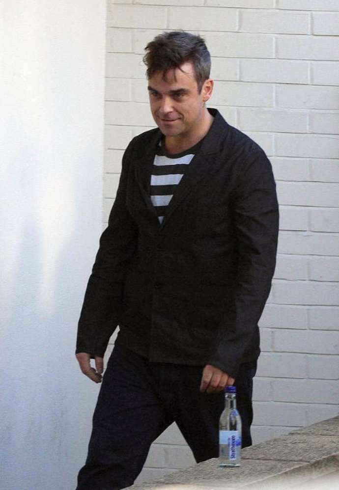 el cantante británico Robbie Williams