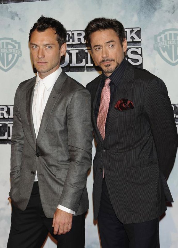 Los actores Jude Law y Robert Downey Junior en la premier de 'Sherlock Holmes' e