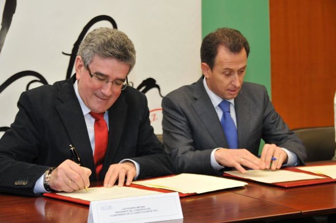 Pizarro y Román, en la firma del convenio
