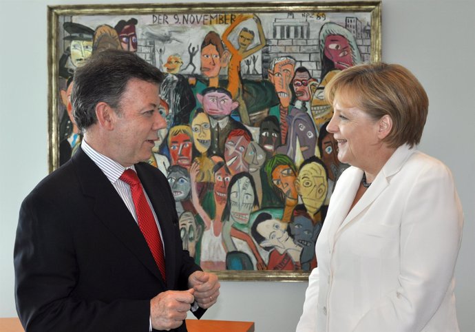 El presidente electo de Colombia, Juan Manuel Santos, y la canciller alemana, An