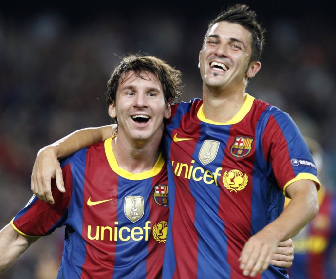 Villa celebra el gol de Messi