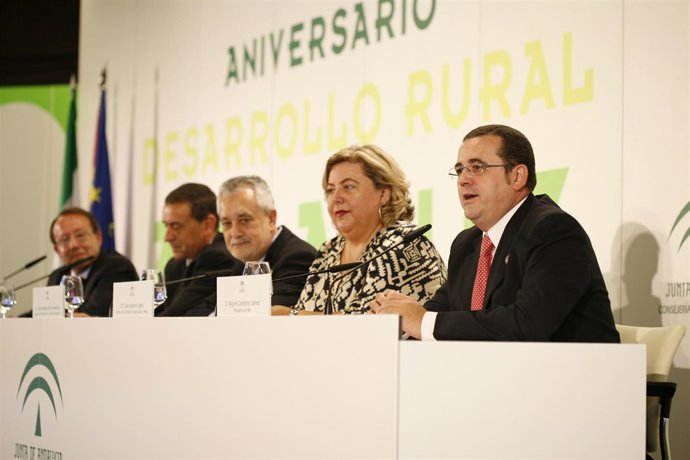 Griñán, Aguilera y Puxeu, durante el acto