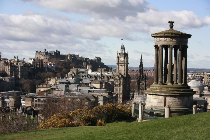 THE CITY OF EDINBURGH - THE CASTLE AND THE CLOCK TOWER OF THE BALMORAL HOTEL FRO