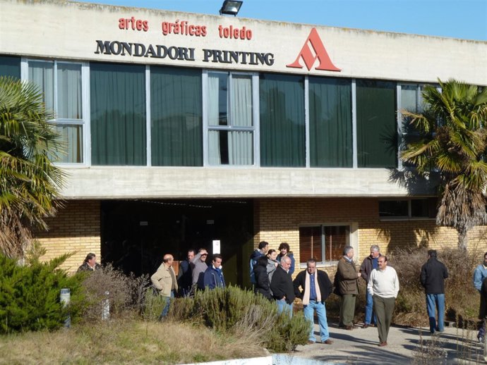 artes graficas trabajadores saliendo