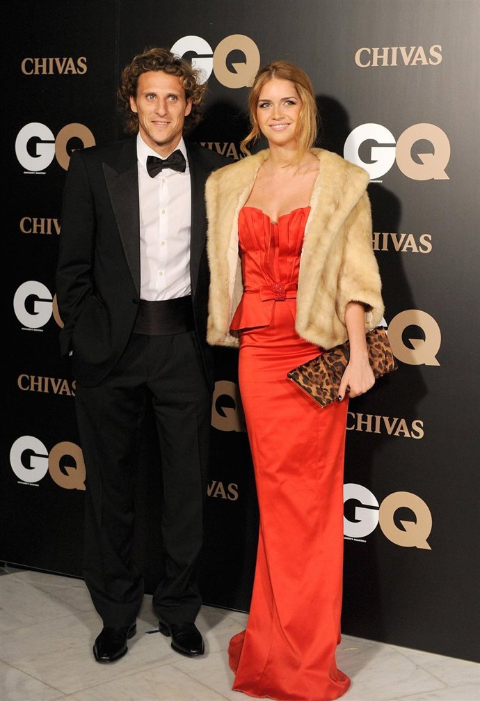 Atletico de Madrid football player Diego Forlan (L) and Zaira Nara attend GQ Awa