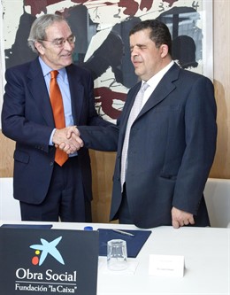 Firma del convenio entre la Obra Socal la Caixa y la Fundación ONCE