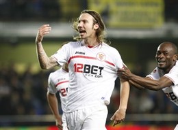 Alexis, en un partido del Sevilla 