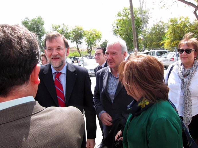 Rajoy y Valcárcel a su llegada a un acto del PP en Llano de Brujas