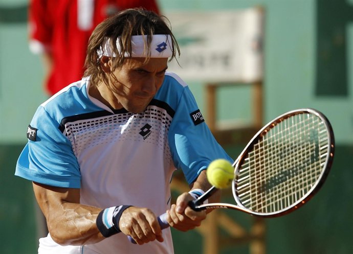 David Ferrer Of Spain Returns The Ball To Gael Monfils Of France During The Fren