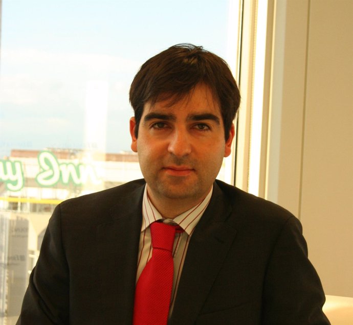 Carlos Arango, De Ernst & Young