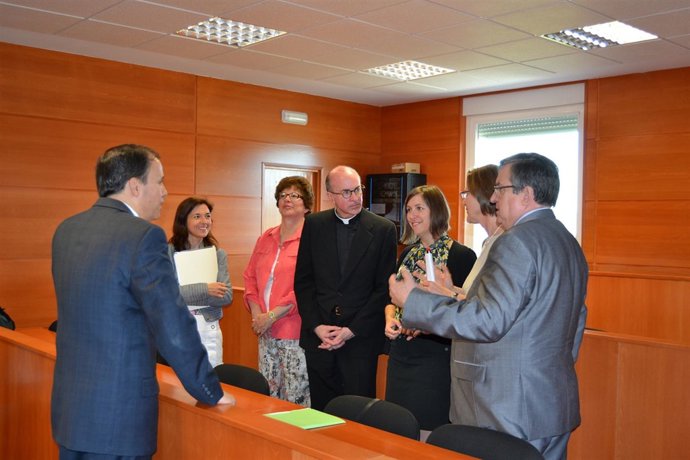 Los Asistentes A La Reunión