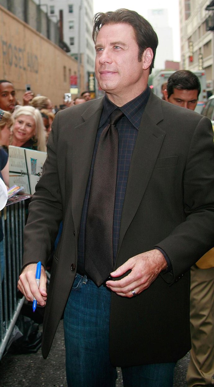 John Travolta Firmando Autógrafos