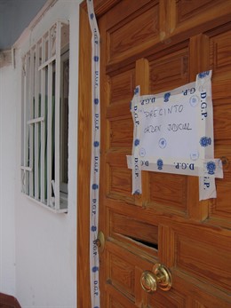 Puerta Del Domicilio De La Víctima Mortal