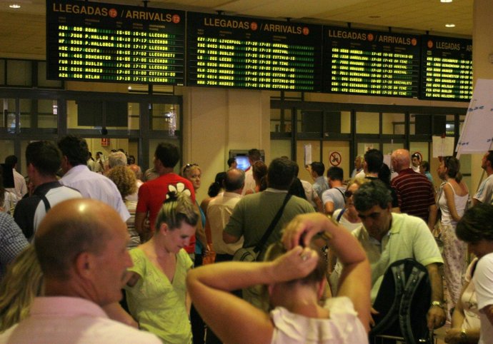 Turistas en aeropuerto 