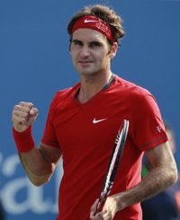 Federer se impone a Cilic y accede a octavos