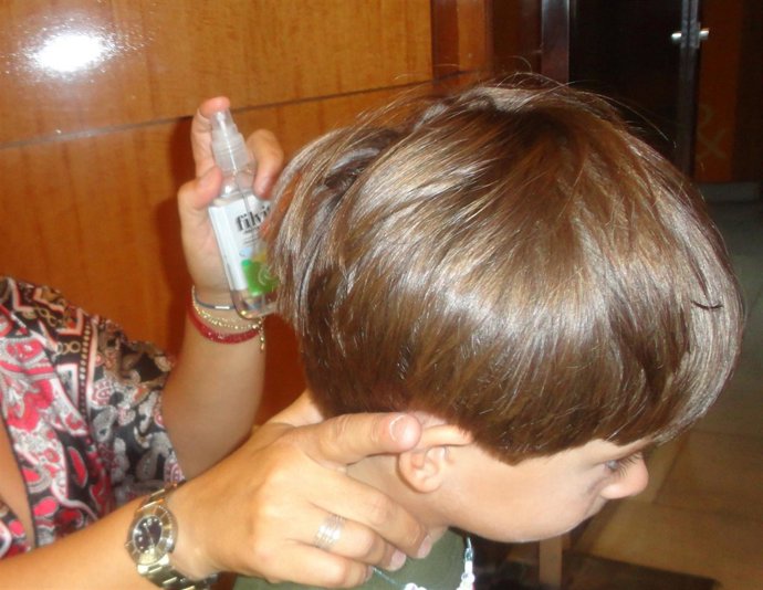 Niño Tratado De Pediculosis