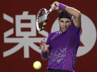 AMP.- Tenis.- Nadal y Ferrer sellan su pase a los cuartos en Tokio