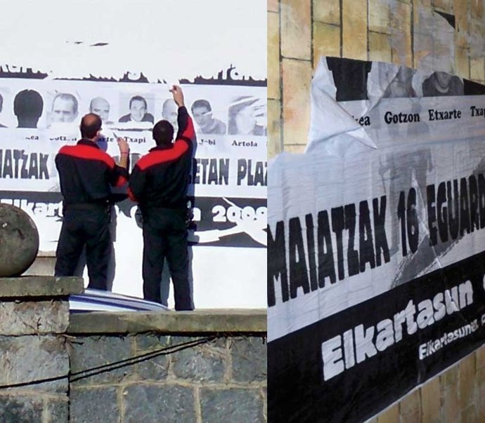 Ertzainas Quitando Fotos De Presos