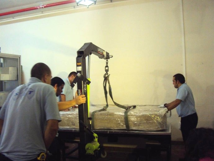 Traslado De La Mesa Romana