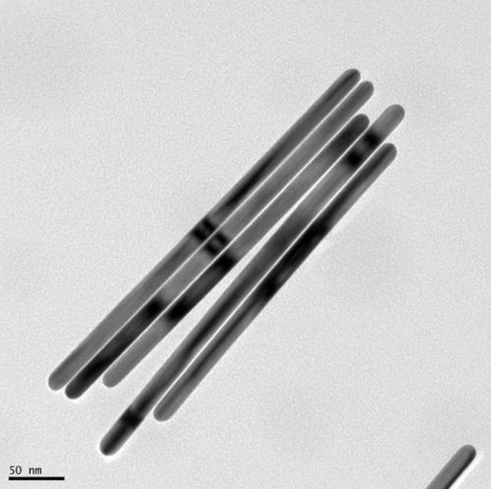 Imagen De Nanopartículas De Oro Esféricas Y Nanobarras De Oro, Que Actúan Como  