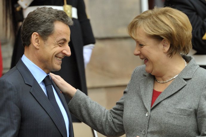 El Presidente De Francia, Nicolas Sarkozy, Y La Canciller De Alemania, Angela Me