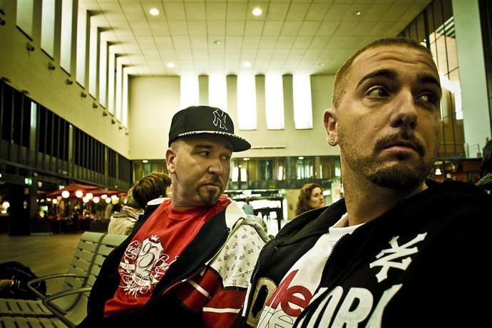 Zatu Y Acción Sánchez, Del Grupo Sevillano De Rap SFDK En Una Foto Promocional