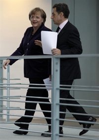 Merkel y Sarkozy defienden la tasa a las transacciones financieras