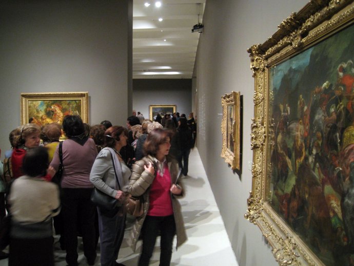 Visitantes En La Exposición De Delacroix