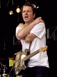 Joe Strummer, Líder De The Clash Durante Un Concierto