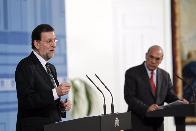 Presidente Del Gobierno, Mariano Rajoy, Y El Secretario General De La OCDE, Ange