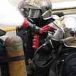 Bomberos De La Comunidad, Durante Una Intervención