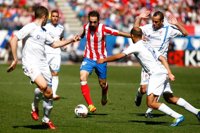 Fútbol.- Juanfran: "Mis inicios en el Atlético no fueron buenos y he trabajado mucho para conseguir esto" 