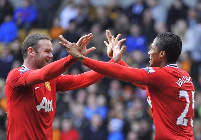 Rooney Y Valencia, Del Manchester United