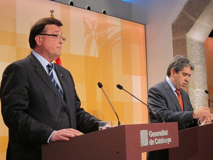 El Conseller Catalán De Empresa F.X.Mena Y El Portavoz Del Govern F.Homs