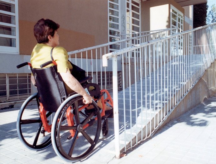 Mujer En Silla De Ruedas 