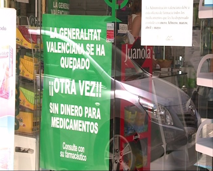 Cartel De Protesta En Una Farmacia Valenciana