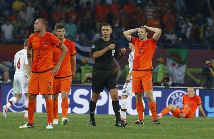 Heitinga, Huntelaar, Robben, Holanda-Dinamarca