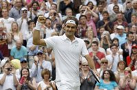 Tenis/Wimbledon.- Federer supera con trabajo y susto a Malisse y se mete en los cuartos