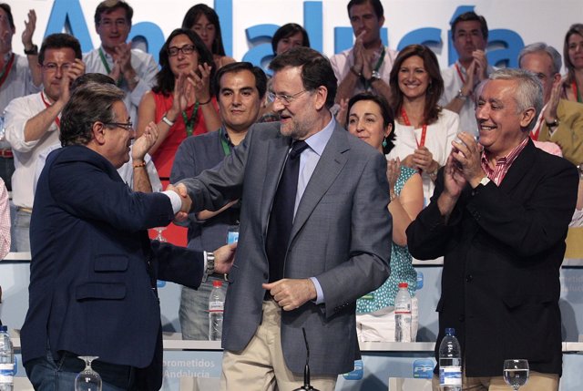 Mariano Rajoy con  Juan Ignacio Zoido y Javier Arenas
