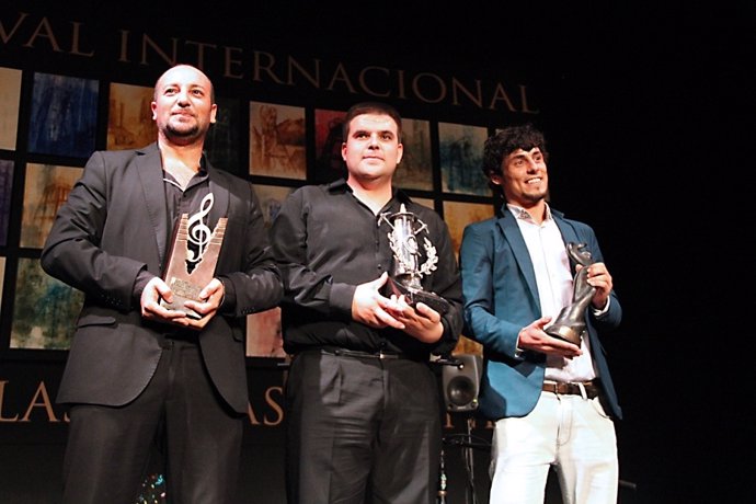 Imagen de los tres ganadores del Cante de las Minas 